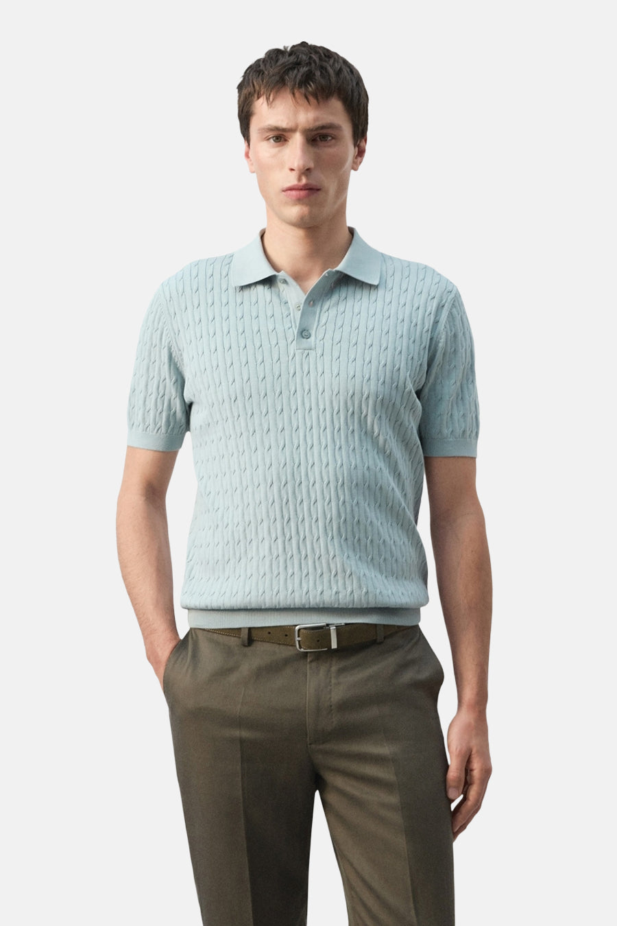 Polo bleue de MANGO avec motif torsadé et manches courtes, vue de dos.
