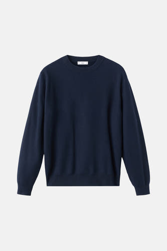 T-shirt bleu avec col rond de MANGO, en une fine texture trée et des manches longues.