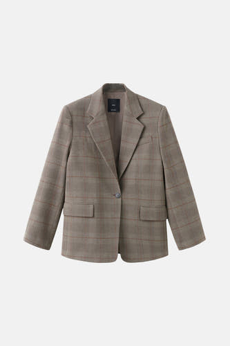 Blazer marron de MANGO avec un motif à carreaux, une fermeture à bouton unique et des poches.