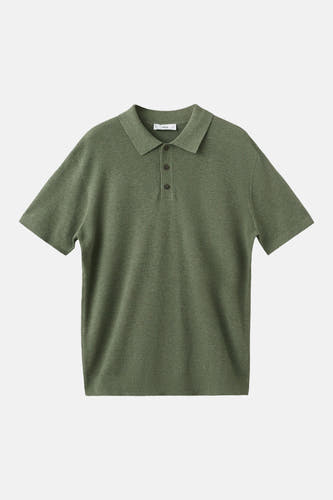 Groene polo van MANGO met korte mouwen en knoopsluiting.