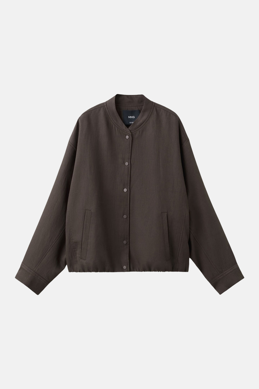 Blazer marron de MANGO à manches longues, fermeture boutonnée et deux poches latérales.