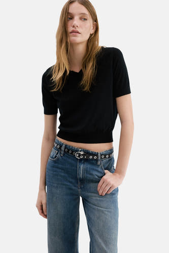 Blauwe denim straight jeans van MANGO, met een zwarte riem en een lichte wassing.