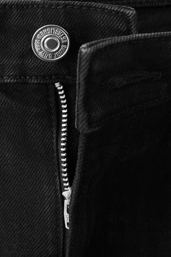 Short noir de MANGO Jeans, avec fermeture à glissière et détail de bouton avec logo de la marque.