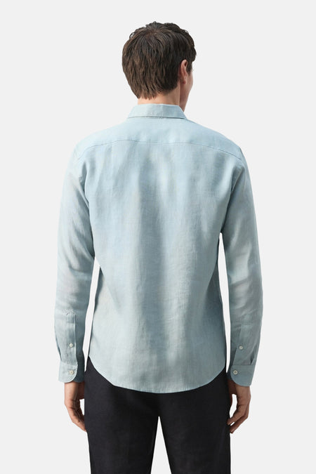 Blauw overhemd met lange mouwen van MANGO, gezien van achteren, met een subtiele textuur en lange mouwen.

