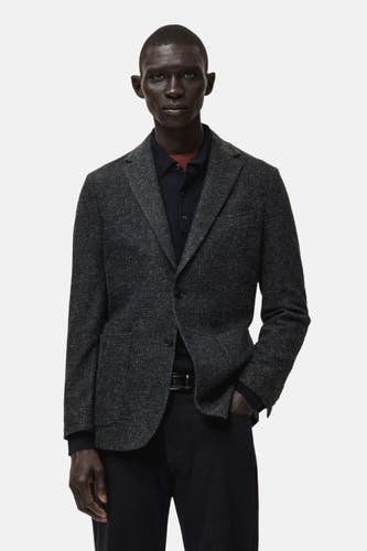 Multikleurige blazer van MANGO, met knoopsluiting en een subtiele textuur.