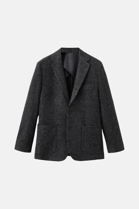 Multikleurige blazer van MANGO, met lange mouwen, revers en zakken op de voorkant.