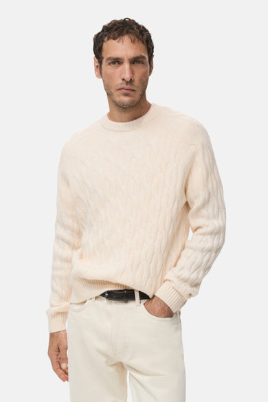 Veste écru avec col rond de MANGO, à motif côtelé et longues manches, vue de derrière.