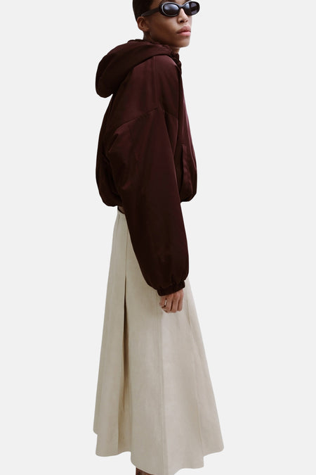 Beige lange rok van MANGO, met een plooibaar ontwerp en een gladde textuur.