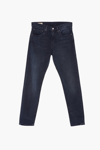 Tapered jeans van blauw denim van Levi's®, op een witte achtergrond.