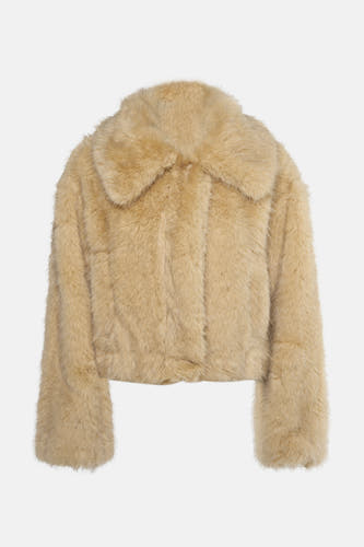 Gele korte jas van TOPSHOP, met een zachte textuur en een kraag.
