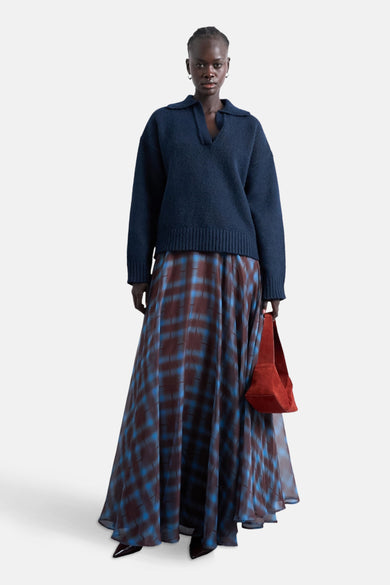 Multikleurige lange rok van TOPSHOP, met een blauw en bruin geruit patroon.