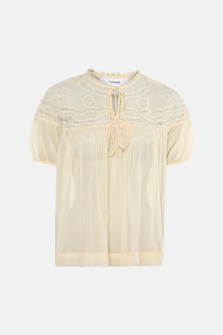 Ecru doorschijnende blouse met korte mouwen van TOPSHOP, met kanten details en striksluiting in de hals.