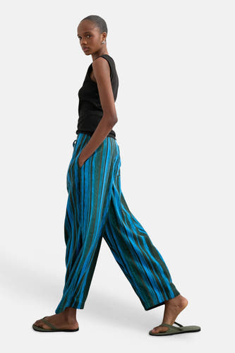 Pantalon ample bleu de TOPSHOP avec des rayures verticales bleues et vert foncé.