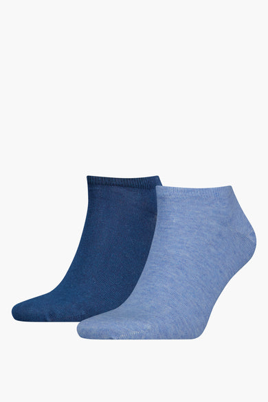 Chaussettes bleues de TOMMY JEANS, avec une texture côtelée et dans deux teintes différentes de bleu.