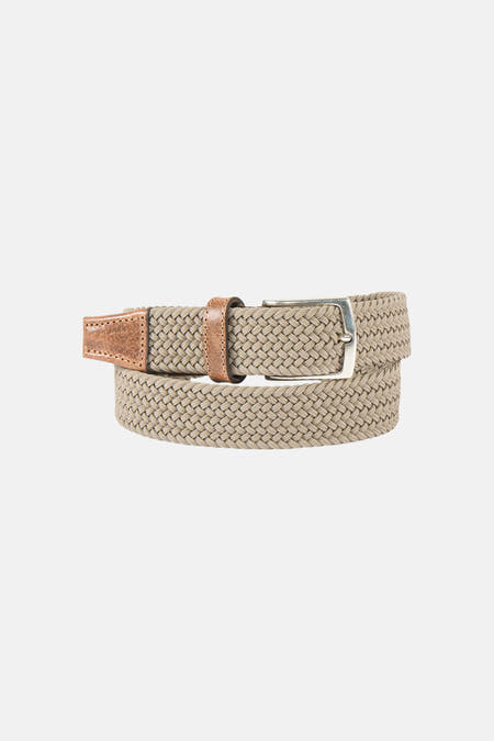 Ceinture écru de Petrol Industries®, avec texture tressée et détails en cuir marron.