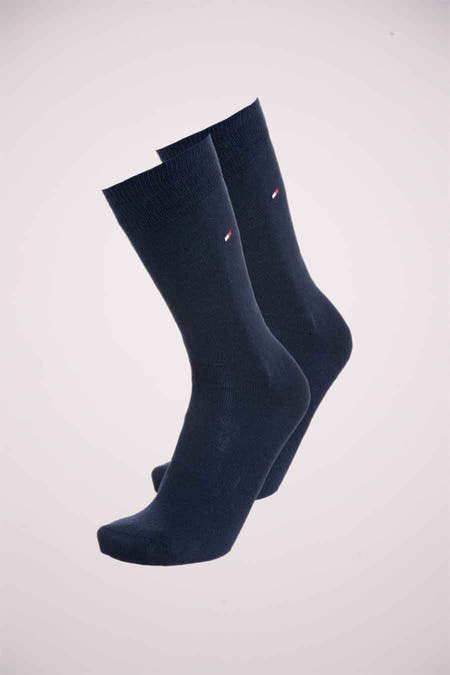 Blauwe sokken van TOMMY JEANS, met een klein logo op de zijkant.
