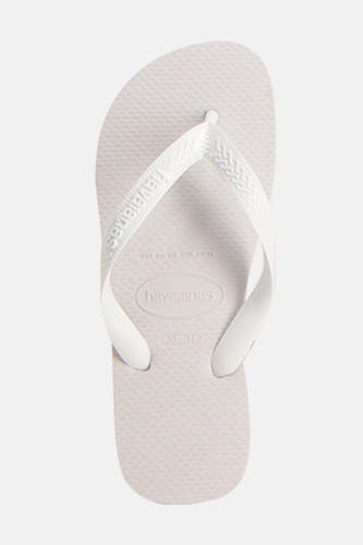 Chaussons blancs Havaianas avec une subtile texture sur la semelle.