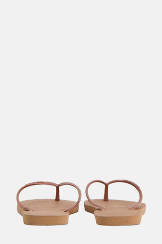 Roze slippers van Havaianas, met een effen zool en bandjes.