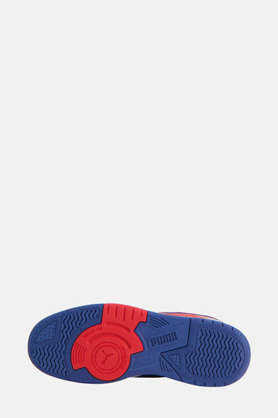 Multikleurige sneakers van PUMA, met een blauwe en rode zool.