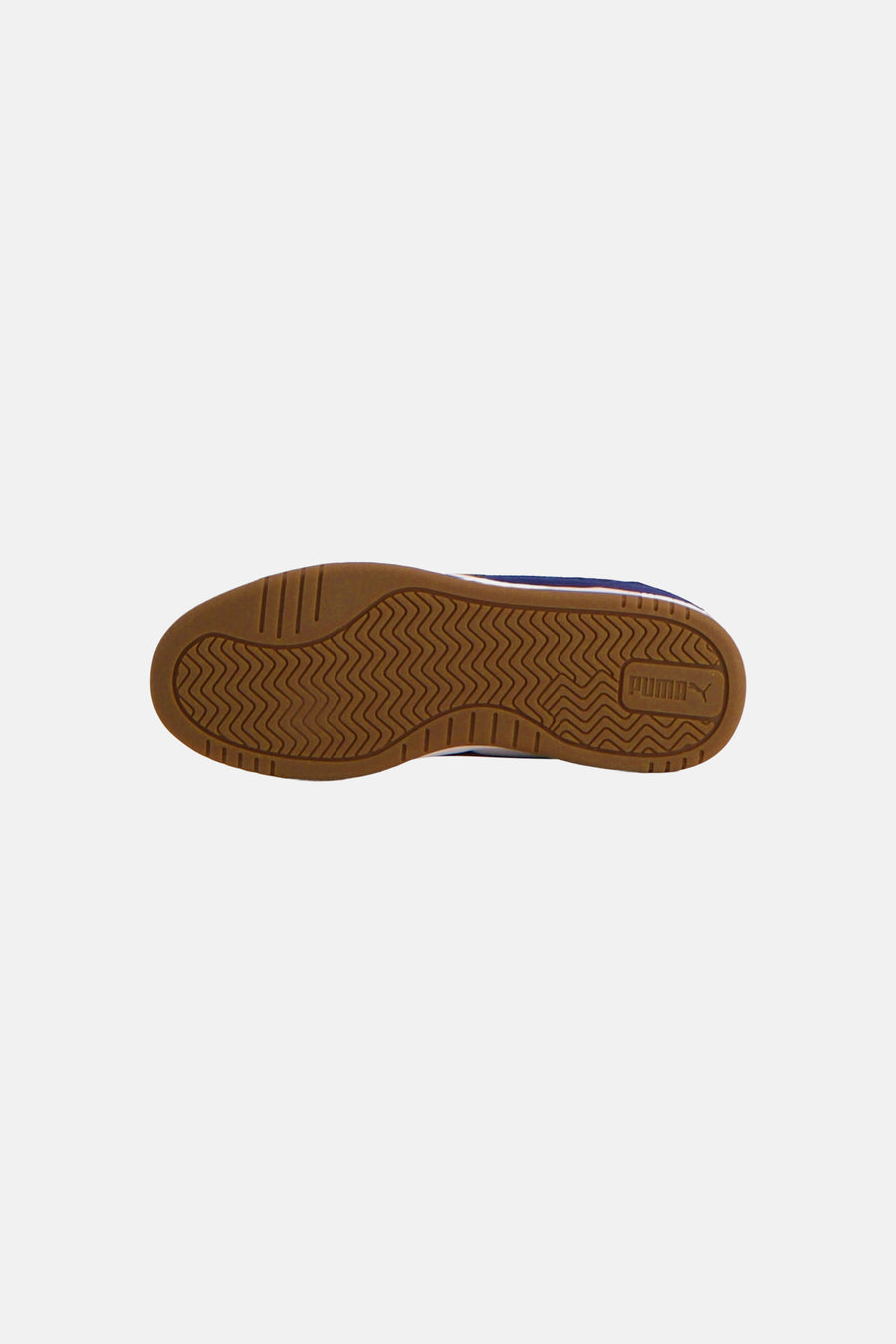 Baskets bleues de PUMA, avec une semelle marron à motif zigzag.