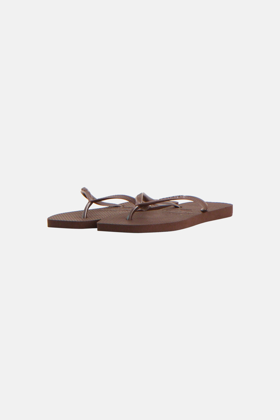 Bruine slippers van Havaianas met glimmende bandjes en een gestreepte zool.