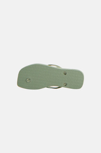 Groene slipper van Havaianas met geribbelde zool en maatmarkering.