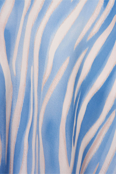 Blauwe lange rok van Terra di Siena met abstract zebraprint en subtiele textuur.
