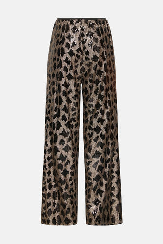 Pantalon noir de PULZ avec imprimé léopard en paillettes dorées sur toute la surface.