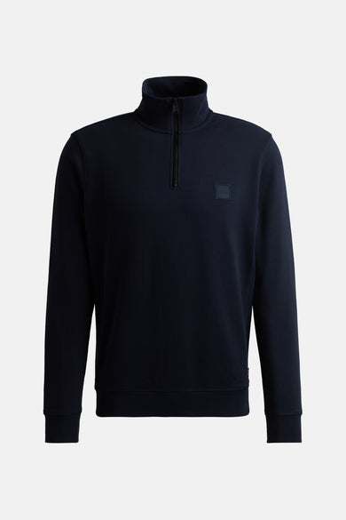 Blauwe sweater met rolkraag van HUGO BOSS ORANGE, met een korte rits en een logo op de borst.
