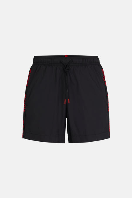 Zwarte zwembroek van HUGO, met rood logo op de zijkant en rode accenten bij het koord.