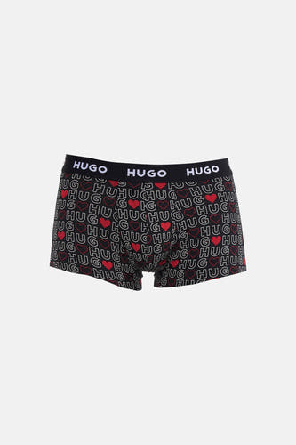 Multikleurige boxershort van HUGO, met herhaald "HUG" patroon en rode hartjes over de gehele short.

