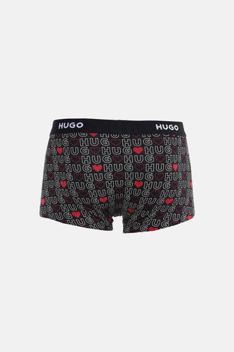 Multikleurige boxershort van HUGO, met een opvallend patroon van 'HUG' logo's en rode harten.
