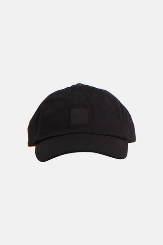 Grijze pet van HUGO BOSS ORANGE met een subtiel logo op de voorkant.
