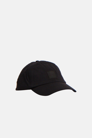 Grijze pet van HUGO BOSS ORANGE, met subtiel logo-detail op de voorkant.