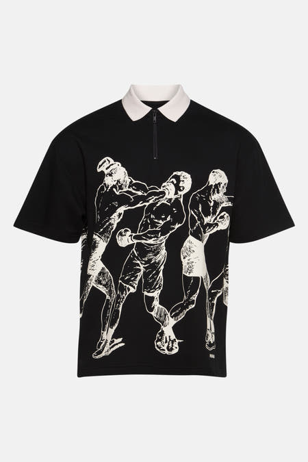 Zwarte polo met korte mouwen van HUGO, met witte kraag en grafische print van boksers.