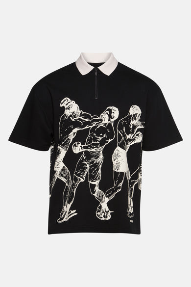 Zwarte polo met korte mouwen van HUGO, met witte kraag en grafische print van boksers.