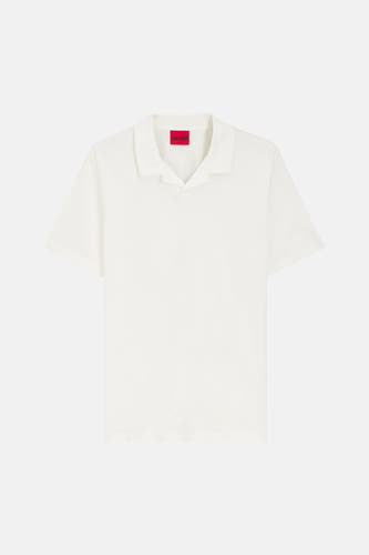 Polo blanche à manches courtes de HUGO, design uni avec un col ouvert.