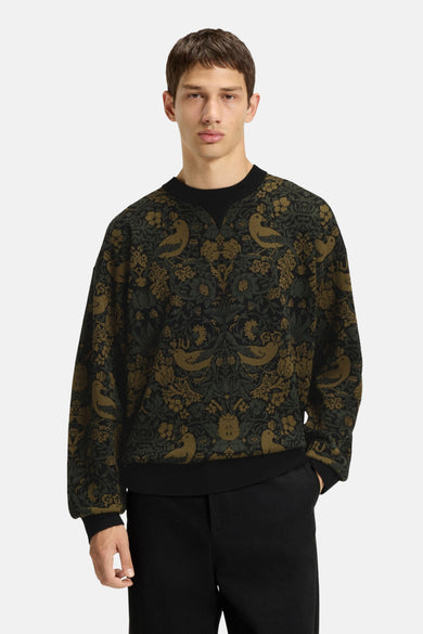 Groene trui met ronde hals van HUGO, voorzien van een decoratief patroon met vogels en bloemen.