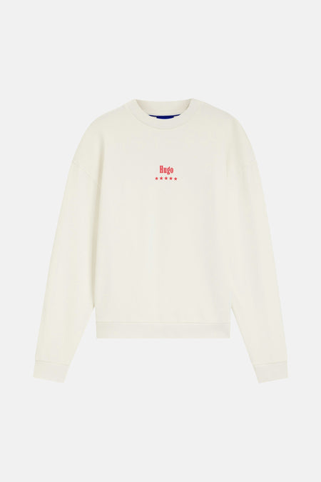 Pull blanc à col rond de HUGO BLUE, avec un logo brodé et des étoiles rouges sur la poitrine.