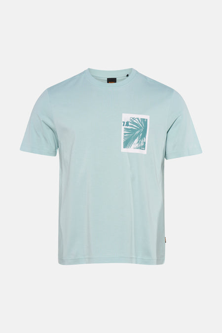 Turquoise T-shirt met korte mouwen van HUGO BOSS ORANGE, voorzien van een borstprint met palmbladeren en '7.8'.