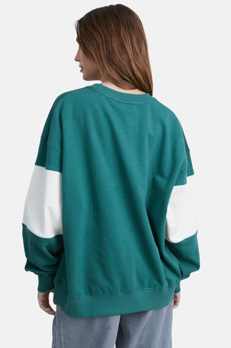 Pull-over vert de 24  cou,, avec man man man man une une bl blanc en vue.