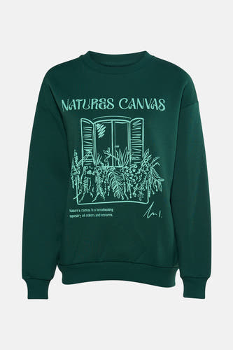 Pull-over vert de 24 Colours GMBH, avec une impression d'une fenêtre avec des plantes et du texte.