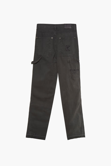 Jean wide gris Karl Kani, avec des poches et des détails de logo sur l'arrière.