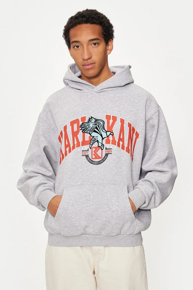 Grijze sweater met kap van Karl Kani, met een opvallende print op de borst en een buidelzak.
