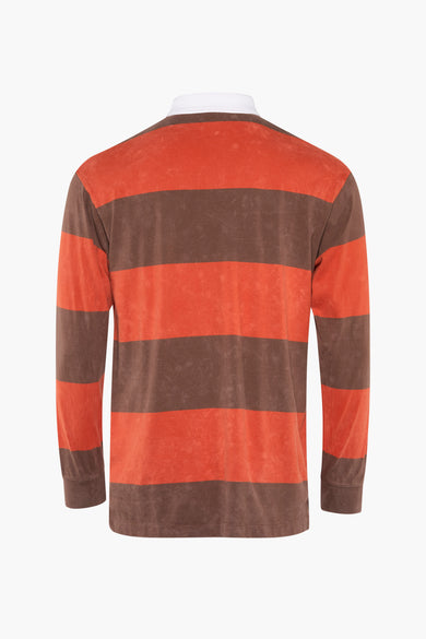 Rode polo met lange mouwen van Karl Kani, met een gestreept bruin en rood patroon.