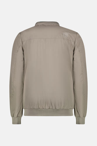 Beige korte jas van Cars, met een effen kleur en ribgebreide boorden aan de achterkant.
