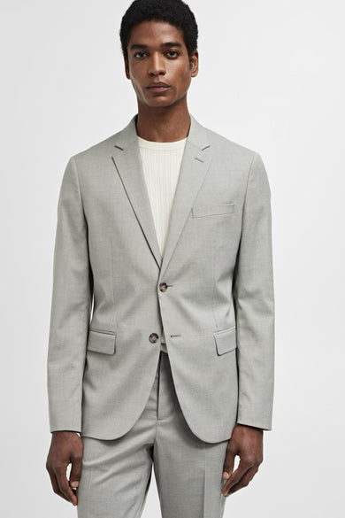 Groene blazer van MANGO, met twee knopen gesloten en een borstzak.