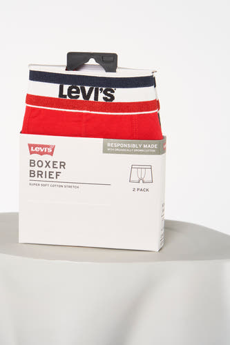 Multikleurige boxershort van Levi's met een gestreepte tailleband in rood, wit en blauw, verpakt in een doos.
