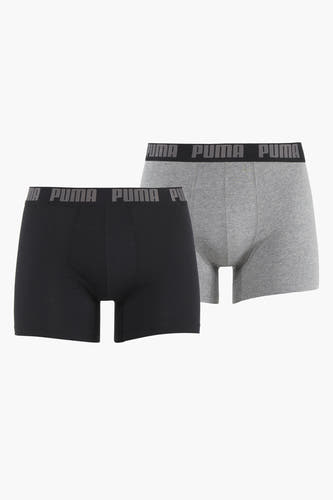Grijze boxershorts van PUMA, met een zwarte variant ervoor.