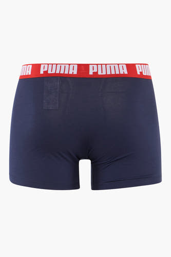 Blauwe boxershort van PUMA, met een rode tailleband met logo-opdruk.